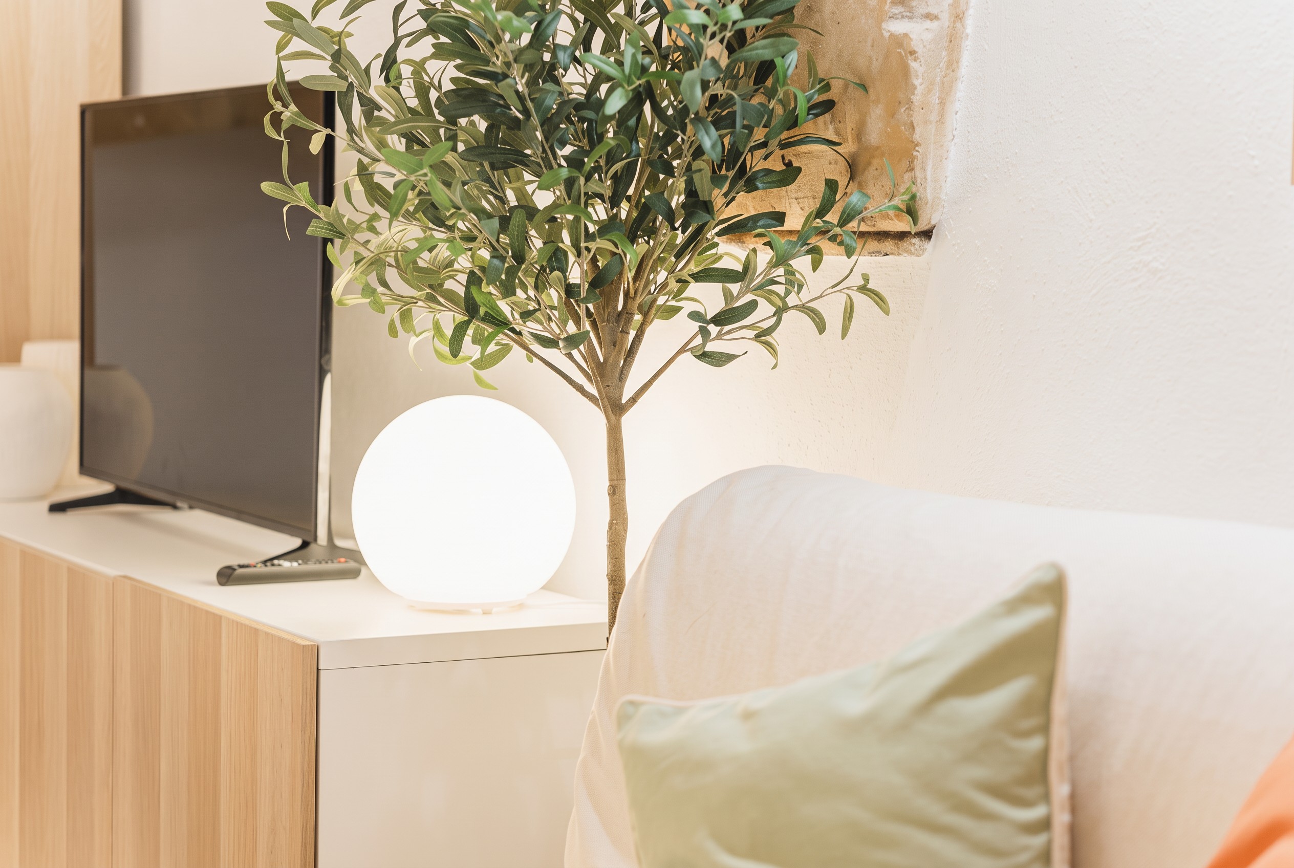 Olive branches and soft lighting in the lounge